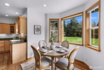 Morning coffees in the light-filled eat-in kitchen