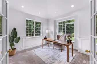 Bonus room on the main floor is perfect for office, media room, study or music room