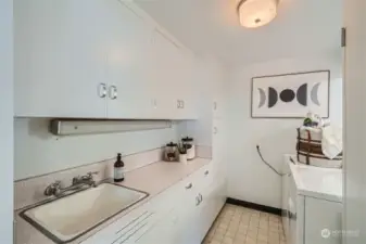 Charming laundry room on the main level