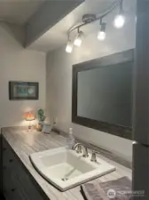 Completely remodeled full bathroom just outside of the quest bedroom.