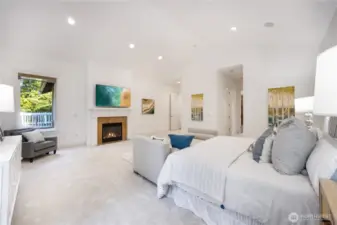 Grand master suite with vaulted ceiling and fireplace