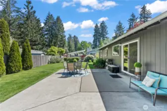 This sun-drenched patio creates a seamless flow between indoor and outdoor living spaces. Picture summer brunches, cozy evening chats, and weekend gatherings—all surrounded by thoughtfully curated plants and a serene setting.