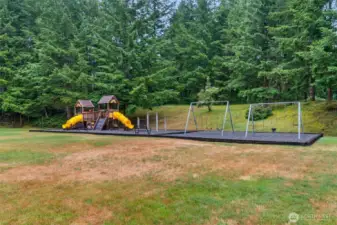 Community park has playground plus back stop & large field