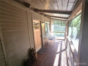 This great front porch is fully covered and fully screened. This allows you to use this area, rain or shine and keep nature out while letting in the sunshine and the views.