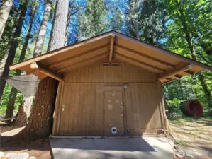Nice covered entry to your large shop. Could be converted to additional living space.