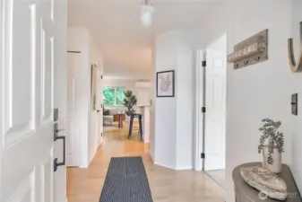 Low maintenance laminate flooring from the entry thru to the main living and kitchen area.