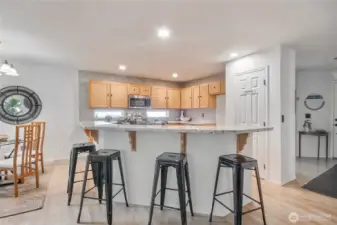 The kitchen includes a pantry offering plenty of storage for all  your cooking essentials.