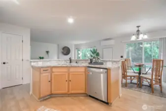 Updated details throughout includes new oil rubbed bronze door handles and hinges on all interior doors and kitchen cabinetry, adding a warm modern touch.