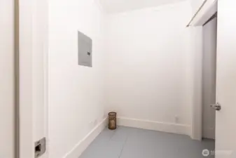 Small separate room could be a changing room or storage or...?