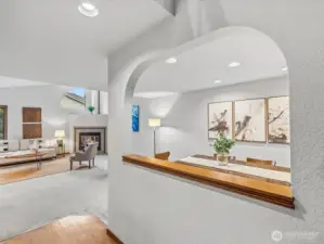 View from hallway towards the living room & dining room on the right