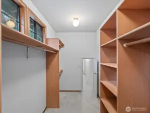 Upper floor primary walk in closet