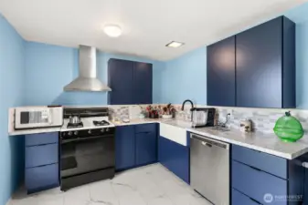 Kitchen with custom drop down cabinets