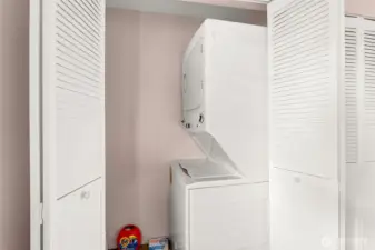 Washer/Dryer located in Primary Bedroom closet