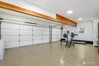 Interior of 3 car garage. Nice epoxy finished floor