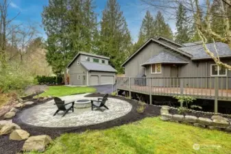 New fire pit & patio next to deck