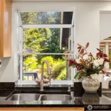 Washing dishes becomes a pleasure with a charming garden view!