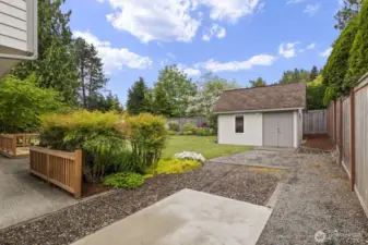 Excellent RV parking including space next to the house, and also a concrete pad behind the fence.