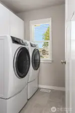 Upstairs laundry room.