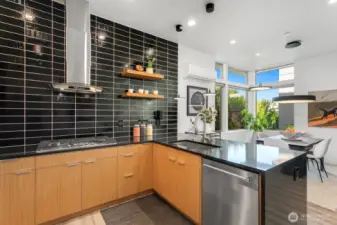 Meals can be easily served at countertop or expanded to dining area
