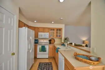 Laminate flooring throughout kitchen, family and dinette space.