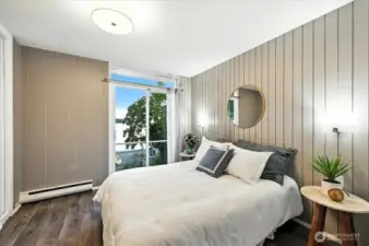 Guest room with deck access to stunning Puget Sound views and fresh sea air.
