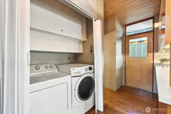 Main floor washer/dryer steps from the kitchen.