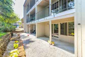 Yellow Flowers Decorate the Covered Patio and Terraced Flower Bed