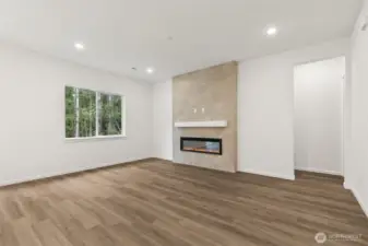 ***Actual Home *** Great room and tiled fireplace