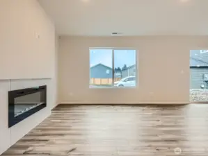 Photo is of the same model home in a different community