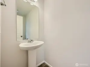 Photo is of the same model home in a different community