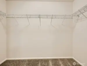 Photo is of the same model home in a different community