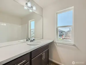 Photo is of the same model home in a different community