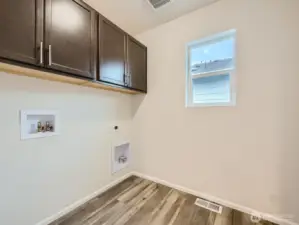 Photo is of the same model home in a different community