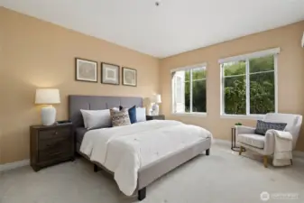 Primary bedroom with views to the river.