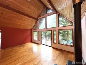 This is the dining area off the kitchen with a sliding glass door to the entry deck.