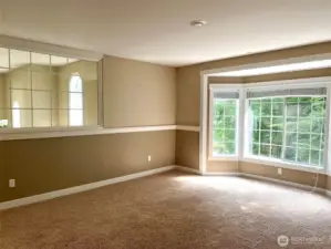 Converted bonus/family room: glass wall enclosed, new door + closet, now an upgraded bedroom.