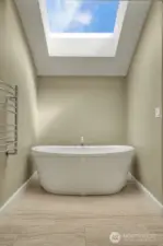 Primary bath with soaking tub, skylight