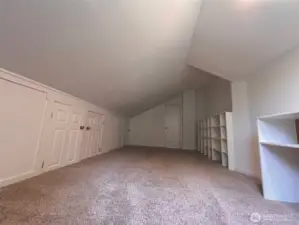 Custom built-ins and ample attic storage