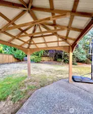 Spacious covered patio with a sturdy gazebo—perfect for year-round outdoor dining, BBQs, or gatherings, rain or shine.