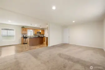 Open concept kitchen, dining & living room