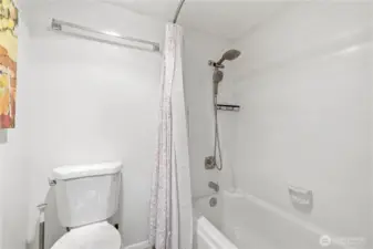 Master Suite Full Bathroom with Elegant Fixtures, Ample Space & Modern Design