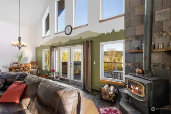 The wood stove keeps the home warm and cozy. French doors to the deck.