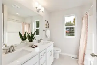 Pictures of same floorplan at different site. Specs/finishes differ.