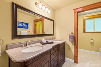 Full bathroom in upstairs hallway.
