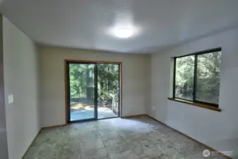 Dining area off of the kitchen with access to the back yard.