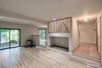 Another view of the living room.  Entry door is to the right, sliders to the back yard are to the left.
