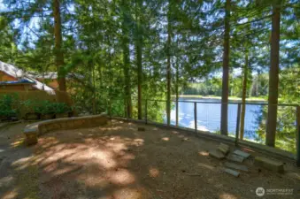 Back yard of house with view of the lake.