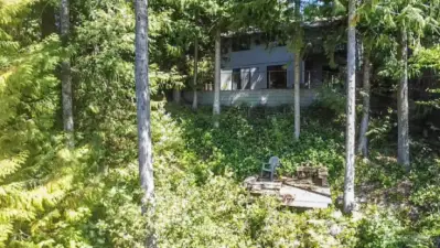 View of the back of the house and the lower deck.