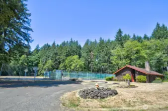 Community park with tennis courts, basketball court, ball field, play area, and shelter for picnics is 2 block away.