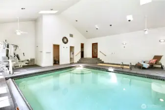 Pool is solar-heated and has electronic cover.